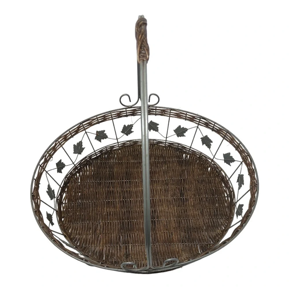 Rattan/Wicker Metal Brown Basket with Leaf Embellishment.